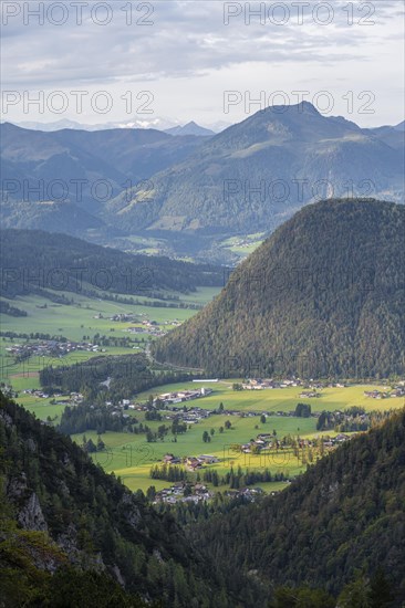 Valley and forested mountains