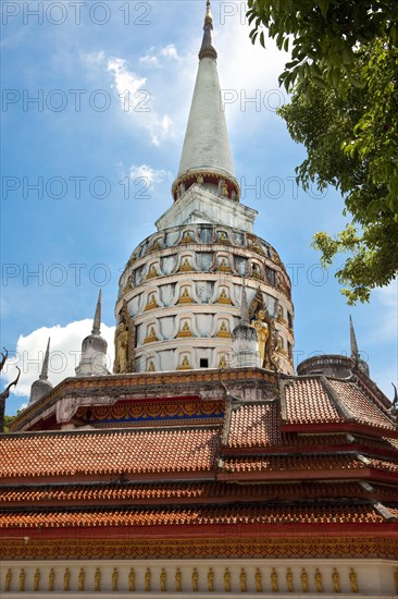 Golden Buddha statues at pagoda tower of Buddhist temple Wat Bang Riang