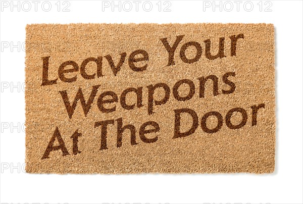 Leave your weapons at the door welcome mat isolated on A white background