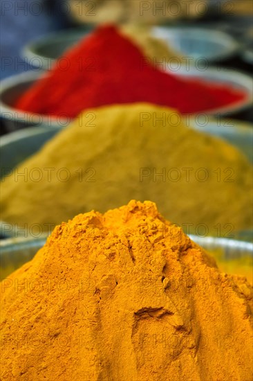 Turmeric curcuma powder and chili powder in spices market in India