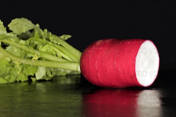 Cut fresh red radish with leaves