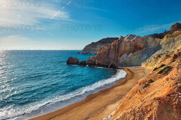 Agios Ioannis greek beach and Aegean sea on sunset