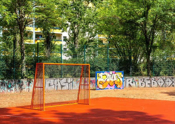 Orange football goal on a playground