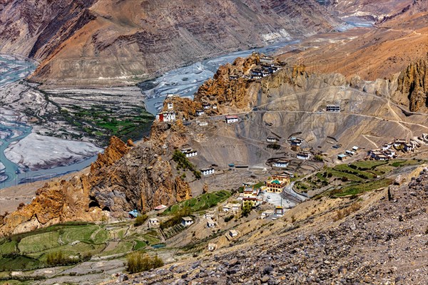 Dhankar Monastery perched on a cliff in Himalayas and village