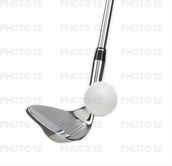 Chrome golf club wedge iron hitting golf ball on white background