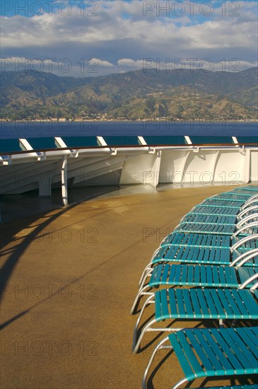 Cruise ship deck abstract shot with deck chairs