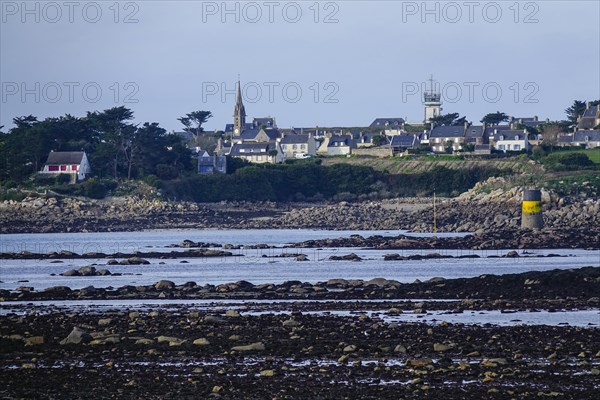 View at low tide from Roscoff to the island Ile de Batz with church