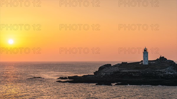 Sunset over Godrevy Lighthouse