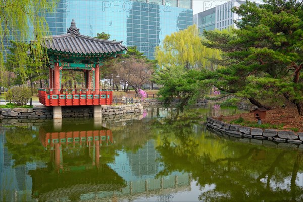 Yeouido Park public park pond with pavilion summerhouse in Seoul