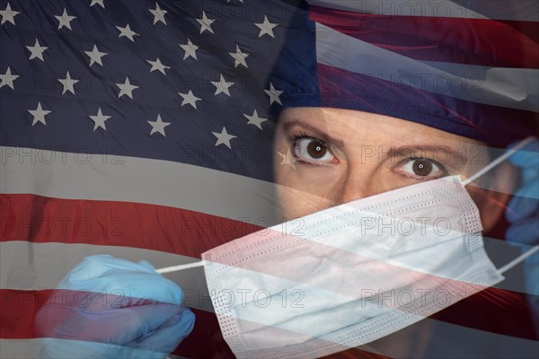 Doctor or nurse wearing medical face mask and scrubs with ghosted american flag