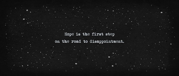 Hope is the first step on the road to disappointment. Famous quote as text art illustration. Typewriter font style over vintage paper dark background