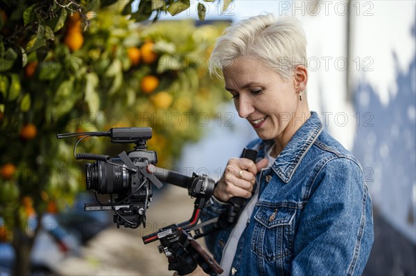 Camera operator with movie setup including a gimbal