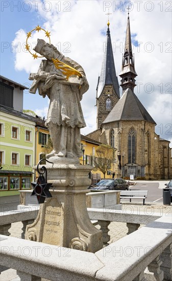 Nepomuk statue on the main square with town parish church