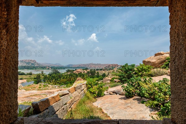 Ancient Vijayanagara Empire civilization ruins of Hampi now famous tourist attraction. Sule Bazaar