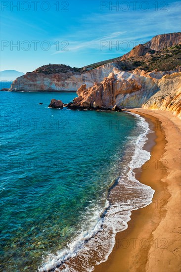 Agios Ioannis greek beach and Aegean sea on sunset. Milos island