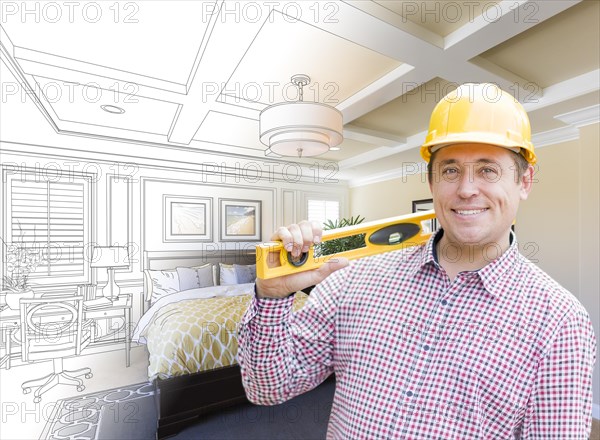 Smiling contractor in hard hat with level over custom bedroom drawing and photo combination