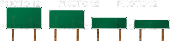 Set of different sized blank green road signs isolated on a white background