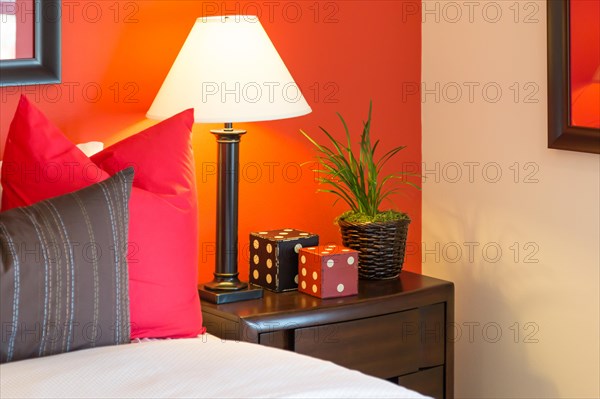 Detail of bedroom nightstand and decorations