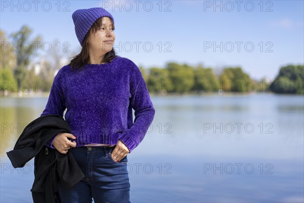 Portrait of a young Latin woman dressed in a pullover