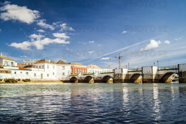 Beautiful cityscape of historic Tavira by Gilao river