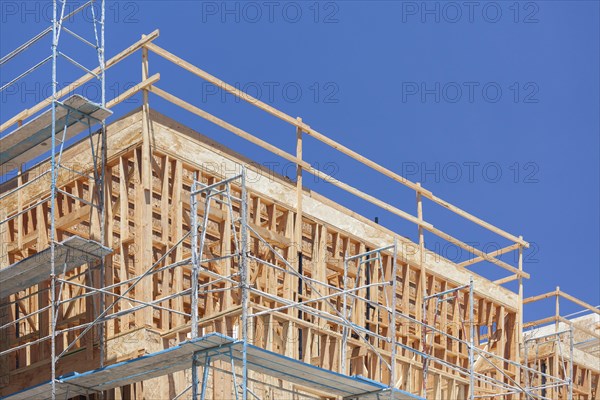 Scaffolding and wood framing at construction site