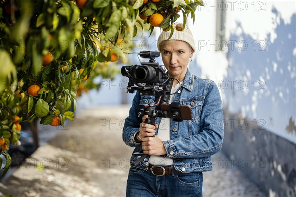 Camera operator with movie setup including a gimbal