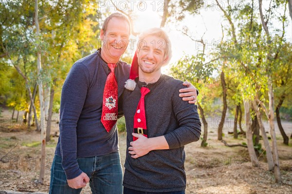 Handsome festive father and son portrait outdoors