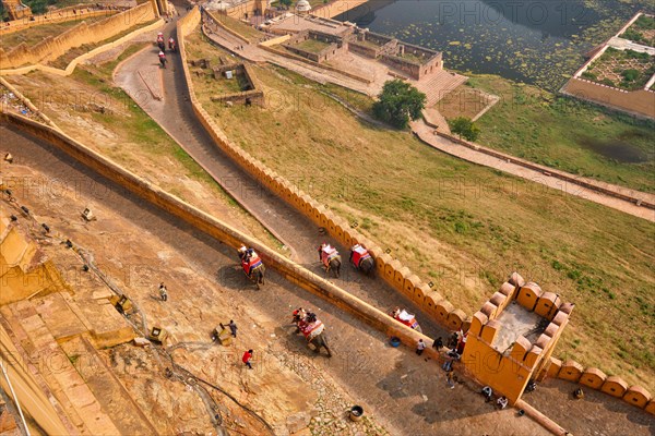 Tourists riding elephants on ascend to Amer