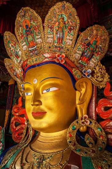 Maitreya Buddha statue face close up in Thiksey Gompa. Ladakh