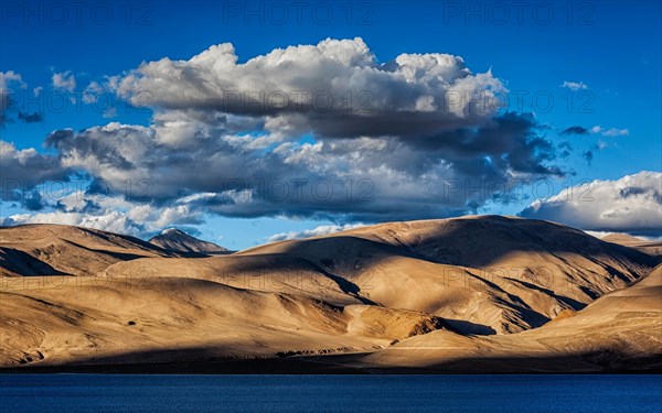 Himalayas and Himalayan mountain lake Tso Moriri on sunset. Korzok