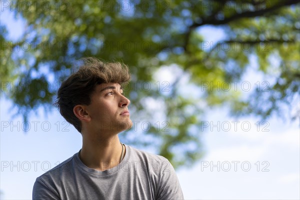 Confident young blonde man portrait