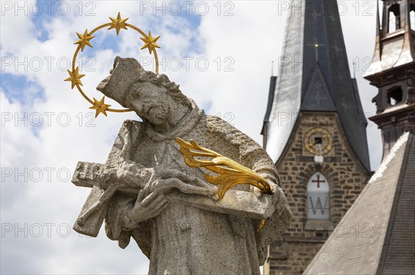 Nepomuk statue on the main square with town parish church