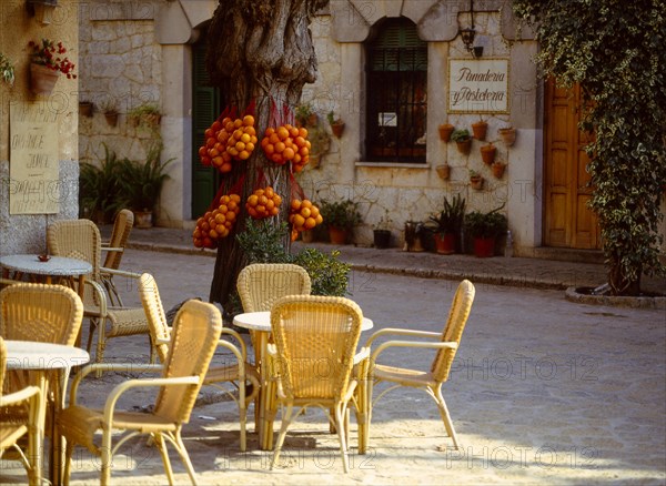 Comfortable sitting-room furniture in a street cafe Valldemossa Majorca Spain Comfortable living-room furniture in a street cafe Valldemossa Majorca Spain