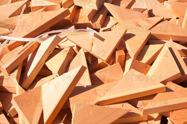 Pile of building lumber scraps at construction site