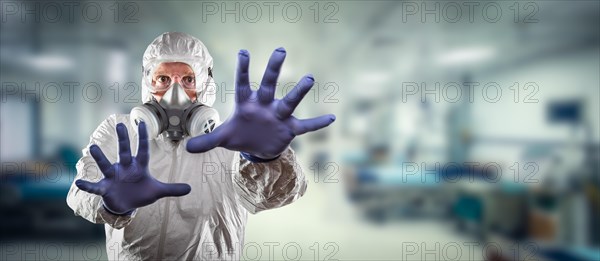 Man wearing hazmat suit