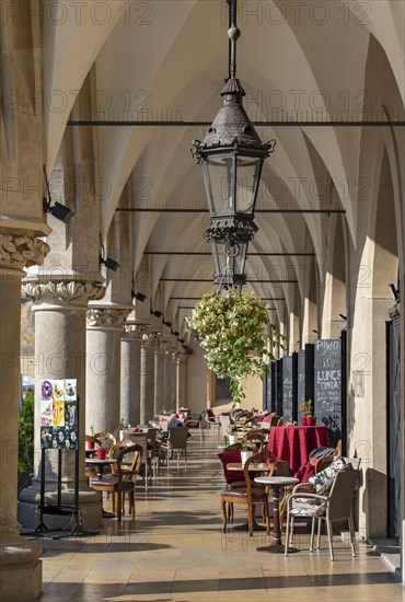 Cafe at arcades of Sukiennice Cloth Hall