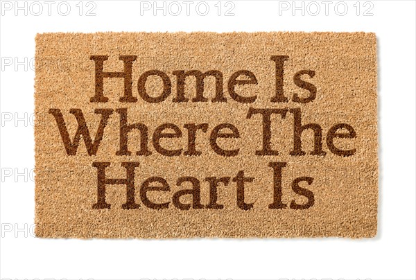 Home is where the heart is welcome mat isolated on A white background