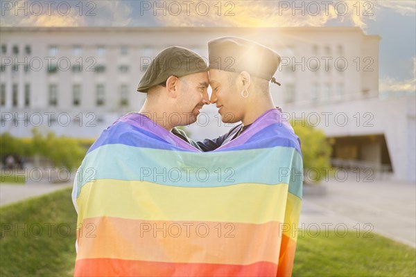 Couple of gay men in love embracing each other