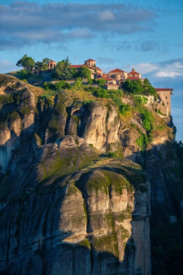 Great Meteoron Monastery perched on a cliff in famous greek tourist destination Meteora in Greece on sunrise