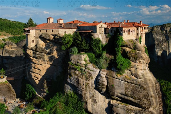 Monastery of Varlaam monastery in famous greek tourist destination Meteora in Greece on sunset with scenic scenery landscape