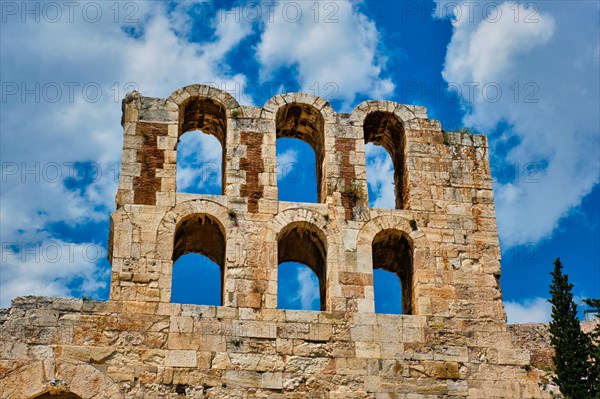 Ruins of Odeon of Herodes Atticus ancient stone Roman theater located on the southwest slope of the Acropolis hill of Athens