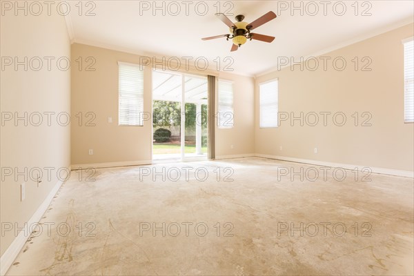 Room with unfinished cement floors