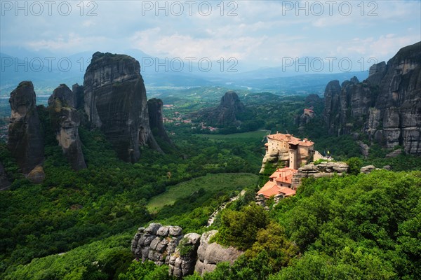 Sunset over monastery of Rousanou and Monastery of St