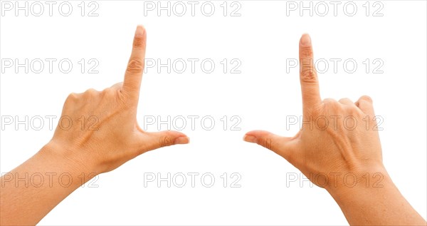 Female hands making frame isolated on a white background with clipping paths for your own positioning
