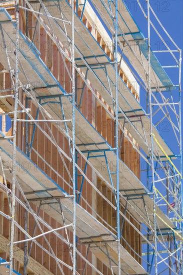 Scaffolding and wood framing at construction site