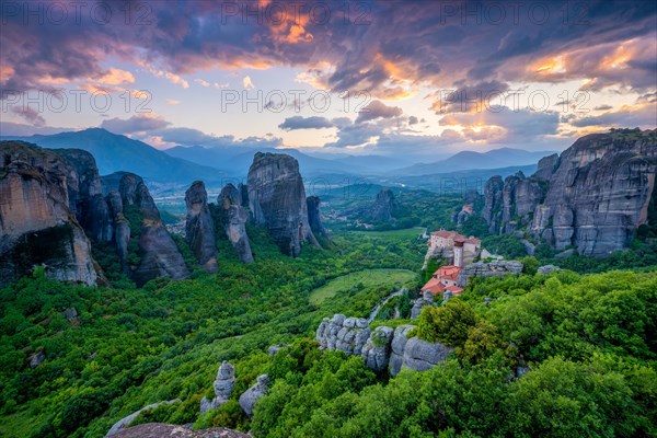 Sunset sky and monastery of Rousanou and Monastery of St