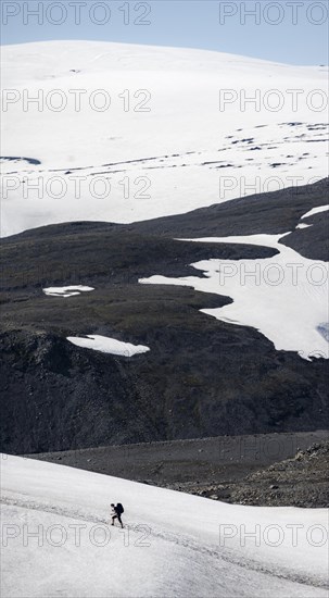 Hiker on snow field