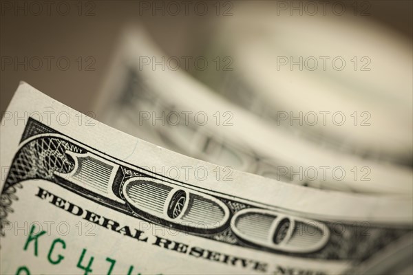 Abstract of one hundred dollar bills