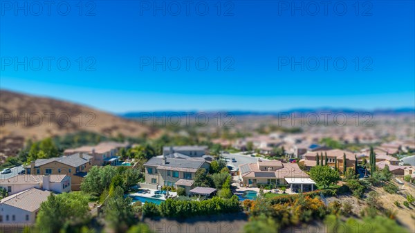 Aerial view of populated neigborhood of houses with tilt-shift blur