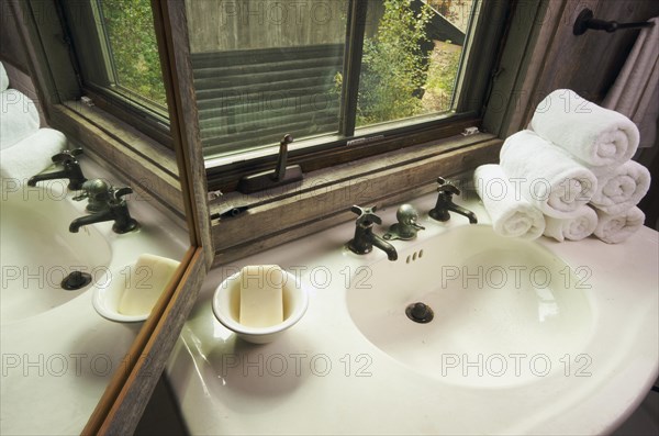 Rustic bathroom sink and window